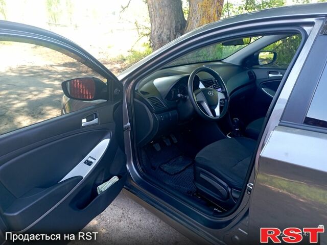 Сірий Хендай Акцент, об'ємом двигуна 1.4 л та пробігом 173 тис. км за 6300 $, фото 4 на Automoto.ua