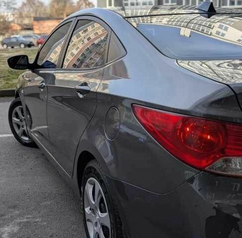 Серый Хендай Акцент, объемом двигателя 1.4 л и пробегом 233 тыс. км за 6480 $, фото 2 на Automoto.ua