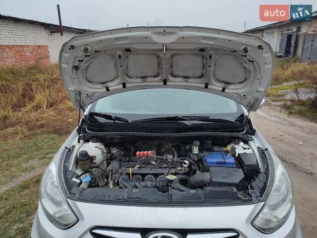 Серый Хендай Акцент, объемом двигателя 1.4 л и пробегом 177 тыс. км за 6100 $, фото 10 на Automoto.ua