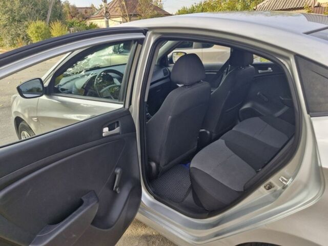 Серый Хендай Акцент, объемом двигателя 1.4 л и пробегом 173 тыс. км за 6800 $, фото 9 на Automoto.ua