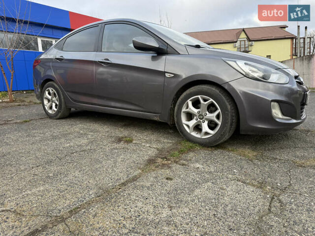 Серый Хендай Акцент, объемом двигателя 1.4 л и пробегом 206 тыс. км за 6400 $, фото 23 на Automoto.ua