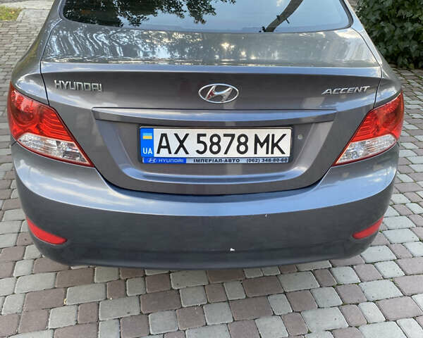 Серый Хендай Акцент, объемом двигателя 1.4 л и пробегом 115 тыс. км за 7600 $, фото 3 на Automoto.ua