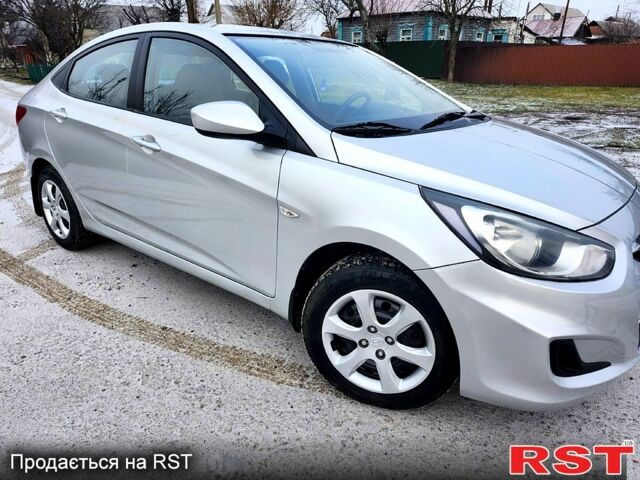 Серый Хендай Акцент, объемом двигателя 1.4 л и пробегом 150 тыс. км за 6550 $, фото 3 на Automoto.ua