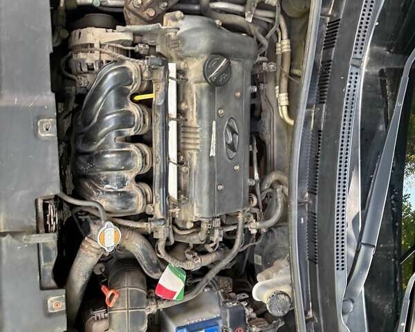 Серый Хендай Акцент, объемом двигателя 1.6 л и пробегом 105 тыс. км за 8300 $, фото 24 на Automoto.ua