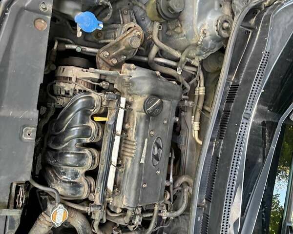 Серый Хендай Акцент, объемом двигателя 1.6 л и пробегом 105 тыс. км за 8300 $, фото 23 на Automoto.ua