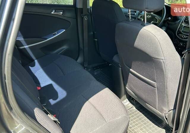 Сірий Хендай Акцент, об'ємом двигуна 1.4 л та пробігом 76 тис. км за 8499 $, фото 21 на Automoto.ua