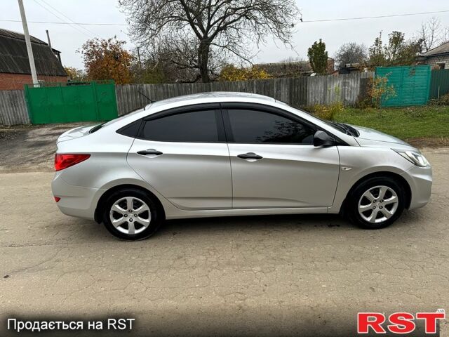 Серый Хендай Акцент, объемом двигателя 1.4 л и пробегом 175 тыс. км за 8000 $, фото 6 на Automoto.ua