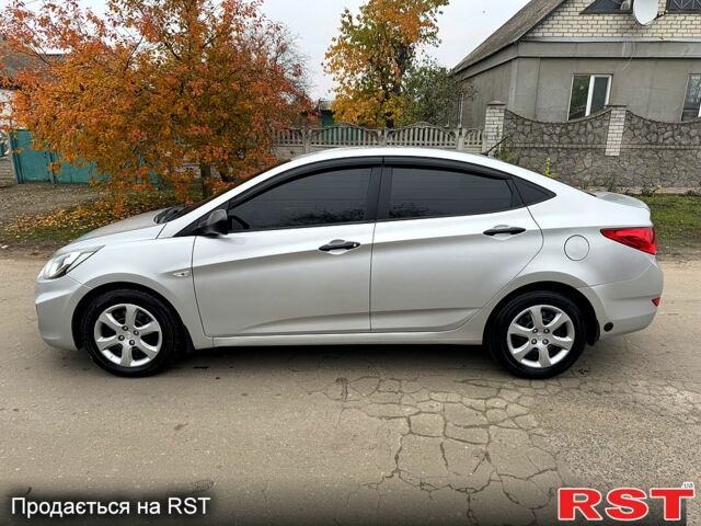 Серый Хендай Акцент, объемом двигателя 1.4 л и пробегом 175 тыс. км за 8000 $, фото 2 на Automoto.ua