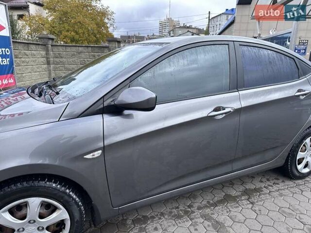 Сірий Хендай Акцент, об'ємом двигуна 1.4 л та пробігом 76 тис. км за 8599 $, фото 18 на Automoto.ua
