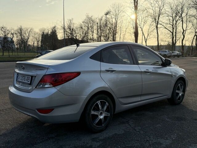 Серый Хендай Акцент, объемом двигателя 1.4 л и пробегом 142 тыс. км за 6900 $, фото 4 на Automoto.ua