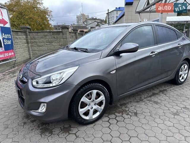 Сірий Хендай Акцент, об'ємом двигуна 1.4 л та пробігом 76 тис. км за 8599 $, фото 6 на Automoto.ua