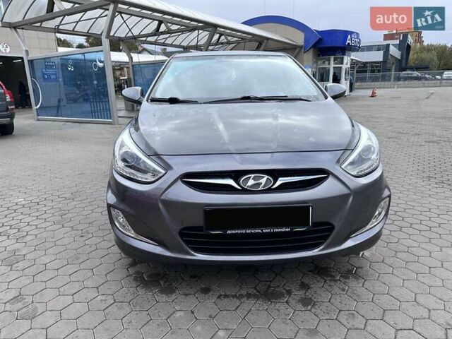 Сірий Хендай Акцент, об'ємом двигуна 1.4 л та пробігом 76 тис. км за 8599 $, фото 10 на Automoto.ua