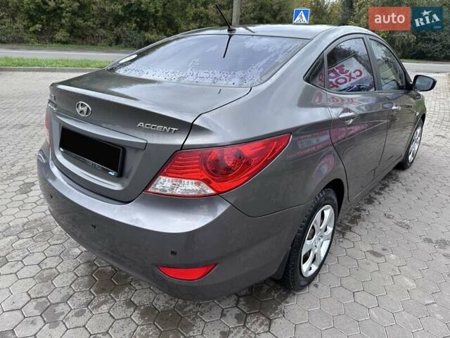 Сірий Хендай Акцент, об'ємом двигуна 1.4 л та пробігом 76 тис. км за 8499 $, фото 17 на Automoto.ua