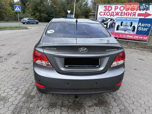 Сірий Хендай Акцент, об'ємом двигуна 1.4 л та пробігом 76 тис. км за 8599 $, фото 8 на Automoto.ua