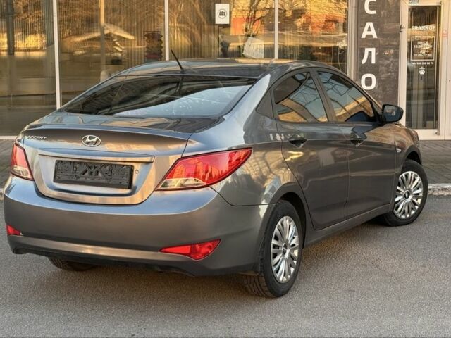 Серый Хендай Акцент, объемом двигателя 1.4 л и пробегом 145 тыс. км за 7700 $, фото 4 на Automoto.ua