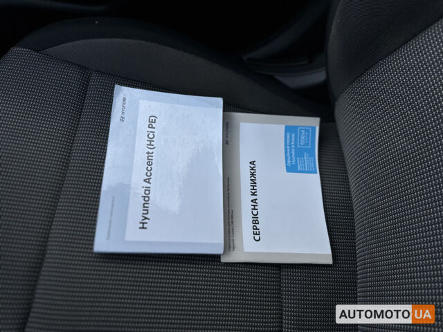 Сірий Хендай Акцент, об'ємом двигуна 1.4 л та пробігом 63 тис. км за 11900 $, фото 27 на Automoto.ua