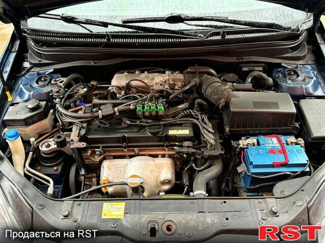 Синий Хендай Акцент, объемом двигателя 1.4 л и пробегом 144 тыс. км за 4950 $, фото 5 на Automoto.ua