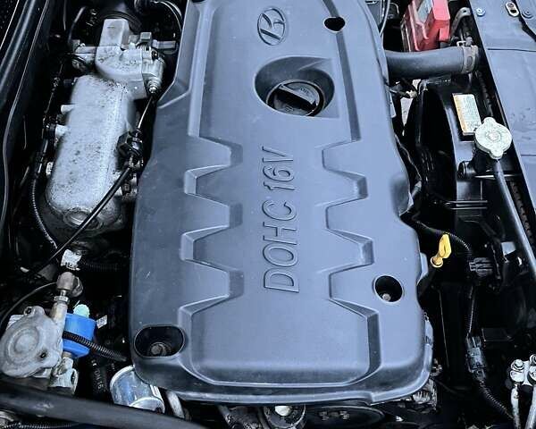 Синий Хендай Акцент, объемом двигателя 1.4 л и пробегом 210 тыс. км за 4100 $, фото 8 на Automoto.ua