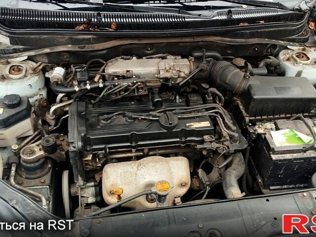 Синий Хендай Акцент, объемом двигателя 1.4 л и пробегом 197 тыс. км за 4200 $, фото 4 на Automoto.ua