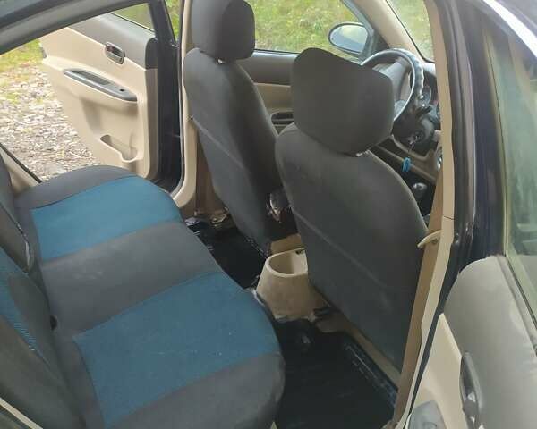 Синий Хендай Акцент, объемом двигателя 1.4 л и пробегом 286 тыс. км за 4800 $, фото 6 на Automoto.ua