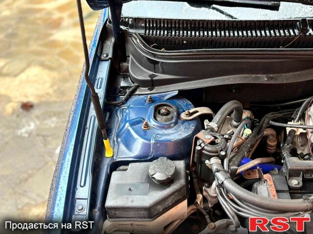 Синий Хендай Акцент, объемом двигателя 1.4 л и пробегом 144 тыс. км за 4950 $, фото 6 на Automoto.ua