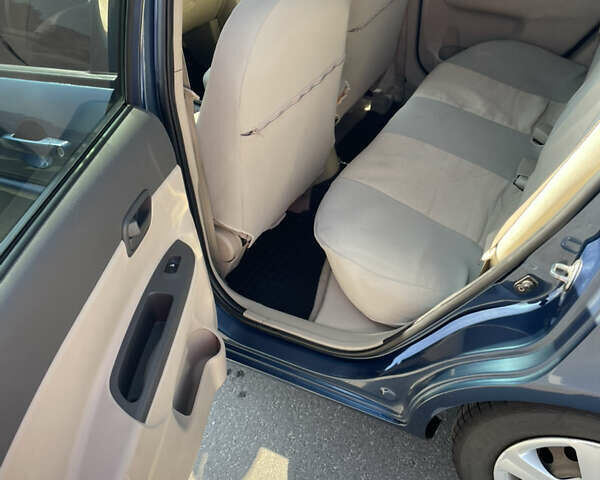 Синій Хендай Акцент, об'ємом двигуна 1.6 л та пробігом 196 тис. км за 5100 $, фото 9 на Automoto.ua