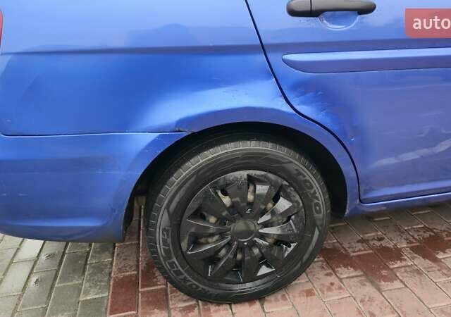 Синий Хендай Акцент, объемом двигателя 1.4 л и пробегом 210 тыс. км за 4000 $, фото 4 на Automoto.ua