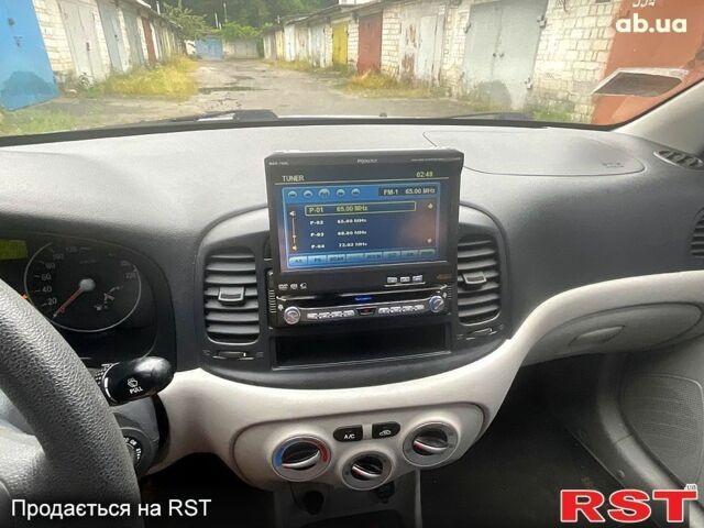 Синий Хендай Акцент, объемом двигателя 1.4 л и пробегом 127 тыс. км за 5400 $, фото 10 на Automoto.ua