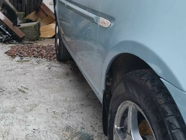 Синий Хендай Акцент, объемом двигателя 1.4 л и пробегом 113 тыс. км за 2400 $, фото 5 на Automoto.ua