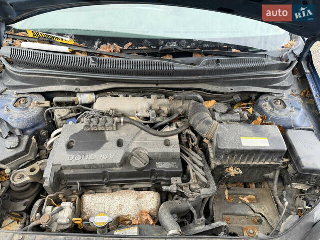 Синий Хендай Акцент, объемом двигателя 1.4 л и пробегом 200 тыс. км за 1500 $, фото 5 на Automoto.ua