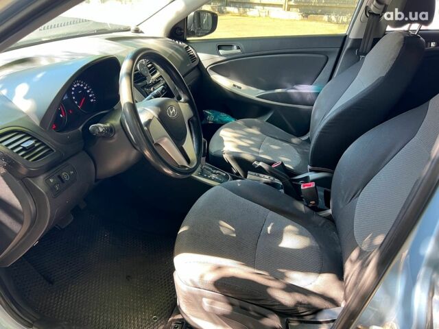 Синій Хендай Акцент, об'ємом двигуна 1.4 л та пробігом 165 тис. км за 6990 $, фото 9 на Automoto.ua