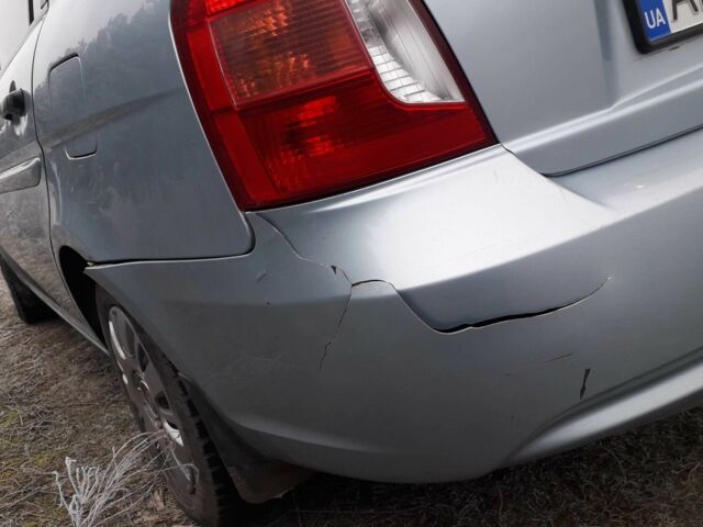 Синий Хендай Акцент, объемом двигателя 1.4 л и пробегом 247 тыс. км за 4500 $, фото 2 на Automoto.ua