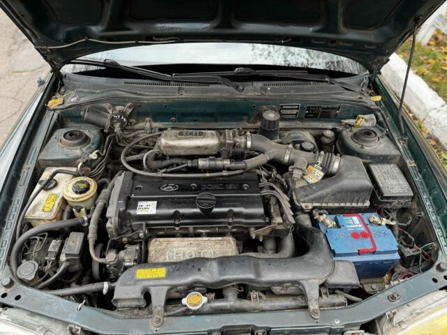 Зеленый Хендай Акцент, объемом двигателя 1.5 л и пробегом 220 тыс. км за 1600 $, фото 16 на Automoto.ua