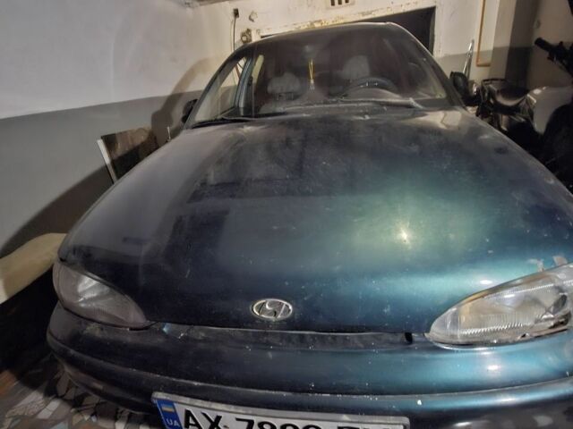 Зеленый Хендай Акцент, объемом двигателя 1.5 л и пробегом 280 тыс. км за 600 $, фото 4 на Automoto.ua