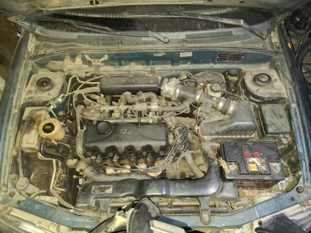 Зеленый Хендай Акцент, объемом двигателя 1.5 л и пробегом 280 тыс. км за 600 $, фото 10 на Automoto.ua