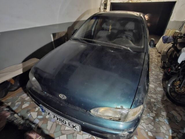 Зеленый Хендай Акцент, объемом двигателя 1.5 л и пробегом 280 тыс. км за 600 $, фото 8 на Automoto.ua