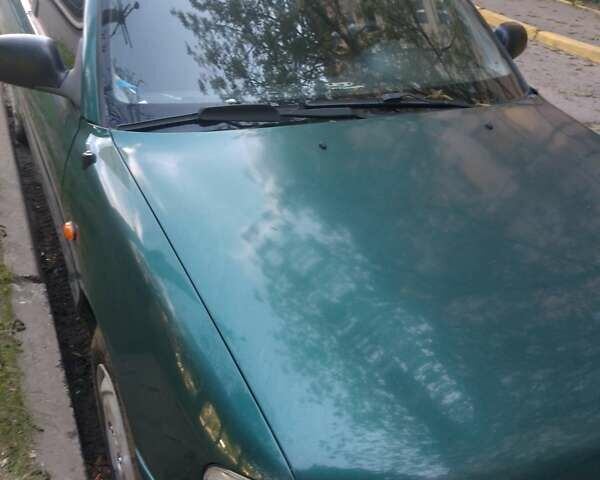 Зелений Хендай Акцент, об'ємом двигуна 1.3 л та пробігом 386 тис. км за 1950 $, фото 4 на Automoto.ua