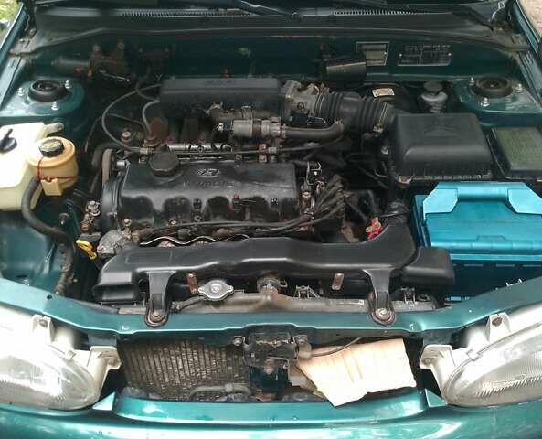 Зелений Хендай Акцент, об'ємом двигуна 1.3 л та пробігом 386 тис. км за 1950 $, фото 7 на Automoto.ua