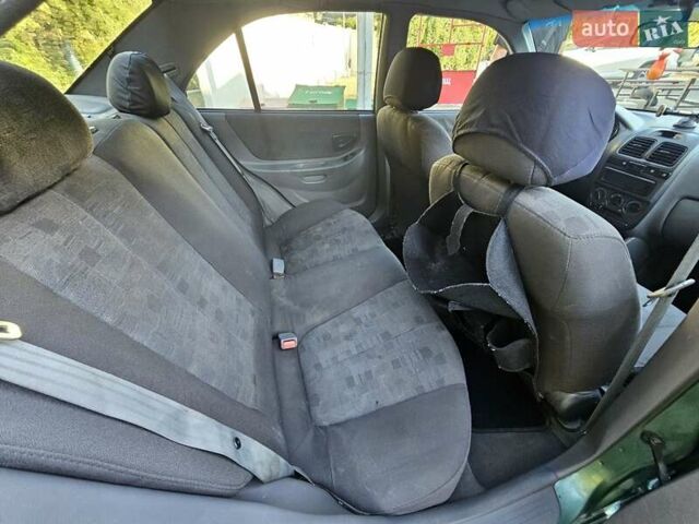 Зелений Хендай Акцент, об'ємом двигуна 1.5 л та пробігом 186 тис. км за 2999 $, фото 5 на Automoto.ua