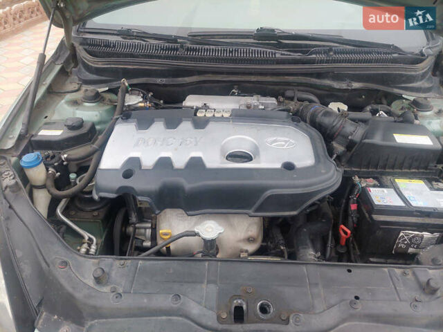 Зелений Хендай Акцент, об'ємом двигуна 1.6 л та пробігом 207 тис. км за 1950 $, фото 11 на Automoto.ua