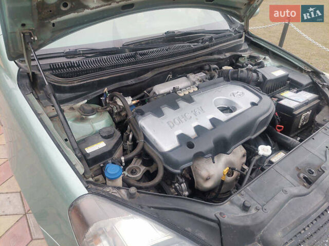 Зелений Хендай Акцент, об'ємом двигуна 1.6 л та пробігом 207 тис. км за 1950 $, фото 12 на Automoto.ua