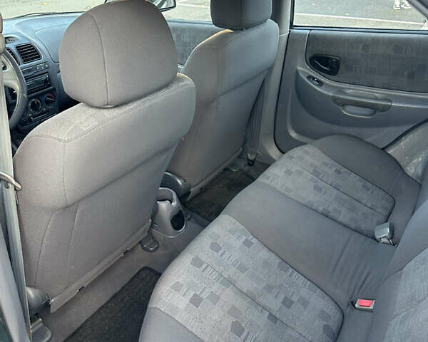 Зеленый Хендай Акцент, объемом двигателя 1.34 л и пробегом 314 тыс. км за 2650 $, фото 10 на Automoto.ua