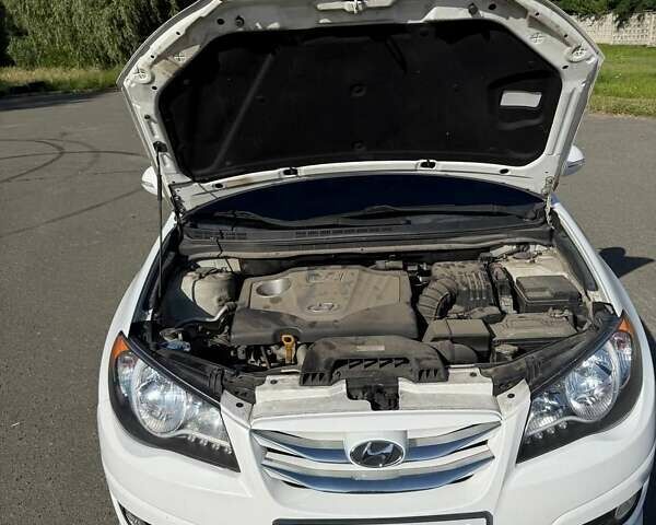 Белый Хендай Аванте, объемом двигателя 1.6 л и пробегом 228 тыс. км за 7000 $, фото 21 на Automoto.ua
