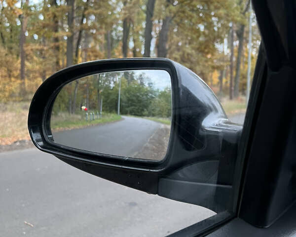 Черный Хендай Аванте, объемом двигателя 1.6 л и пробегом 154 тыс. км за 6000 $, фото 26 на Automoto.ua