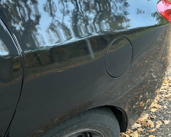 Черный Хендай Аванте, объемом двигателя 1.6 л и пробегом 154 тыс. км за 6000 $, фото 11 на Automoto.ua