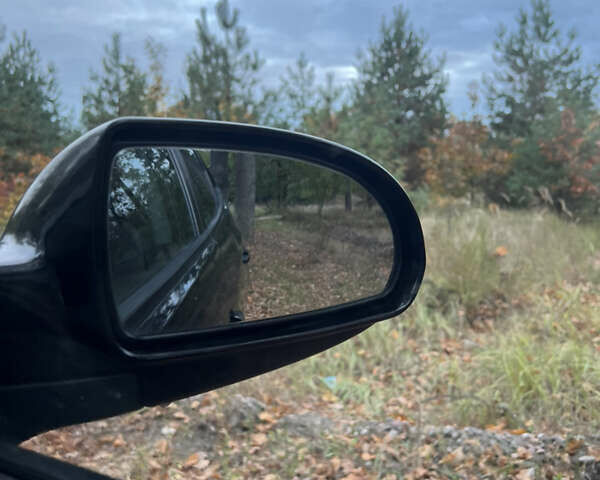 Черный Хендай Аванте, объемом двигателя 1.6 л и пробегом 154 тыс. км за 6000 $, фото 25 на Automoto.ua