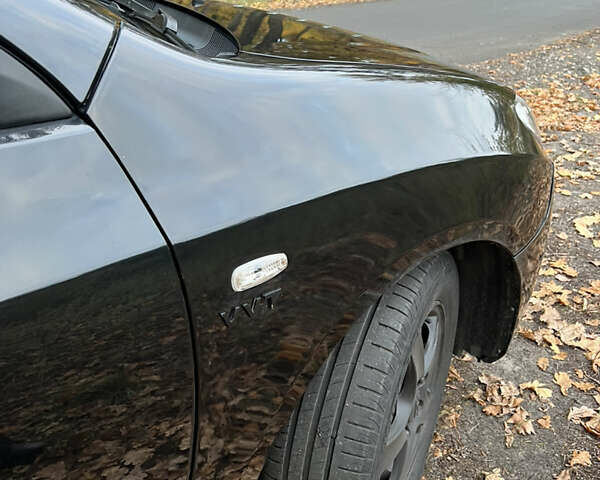 Черный Хендай Аванте, объемом двигателя 1.6 л и пробегом 154 тыс. км за 6000 $, фото 16 на Automoto.ua