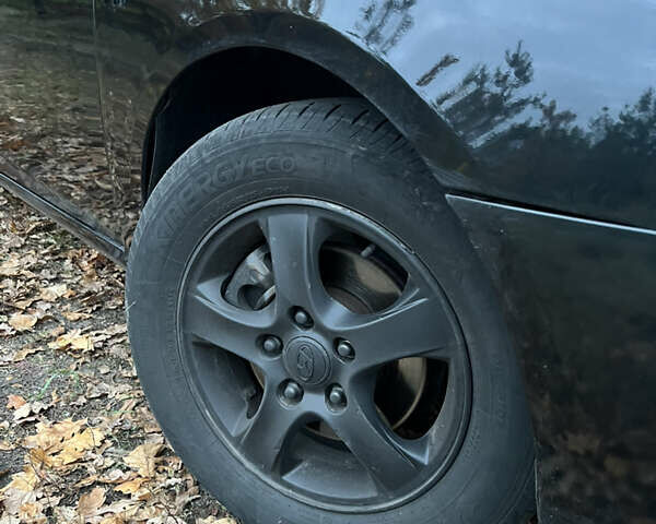 Черный Хендай Аванте, объемом двигателя 1.6 л и пробегом 154 тыс. км за 6000 $, фото 54 на Automoto.ua