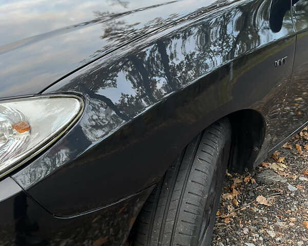 Черный Хендай Аванте, объемом двигателя 1.6 л и пробегом 154 тыс. км за 6000 $, фото 15 на Automoto.ua