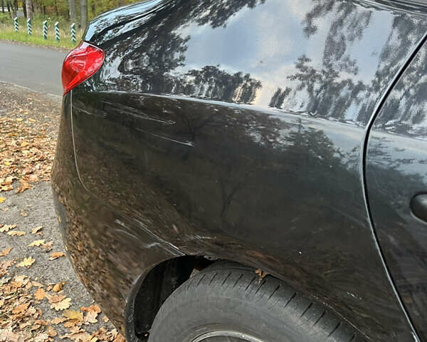 Черный Хендай Аванте, объемом двигателя 1.6 л и пробегом 154 тыс. км за 6000 $, фото 9 на Automoto.ua